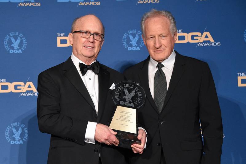 Frank Capra Achievement Award recipient assistant director Joseph P  Reidy, left, with director Michael Mann. AFP