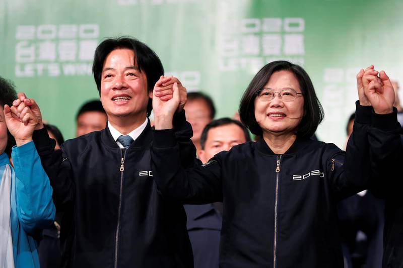 Taiwan Vice President-elect William Lai and incumbent Taiwan President Tsai Ing-wen celebrate at a rally after their election victory, outside the Democratic Progressive Party (DPP) headquarters in Taipei, Taiwan January 11, 2020. REUTERS/Tyrone Siu