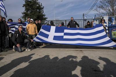 Members of the Greek far-right hold a demonstration in front of the Greek-Turkish border gate in Kastanies, Greece. Getty Images