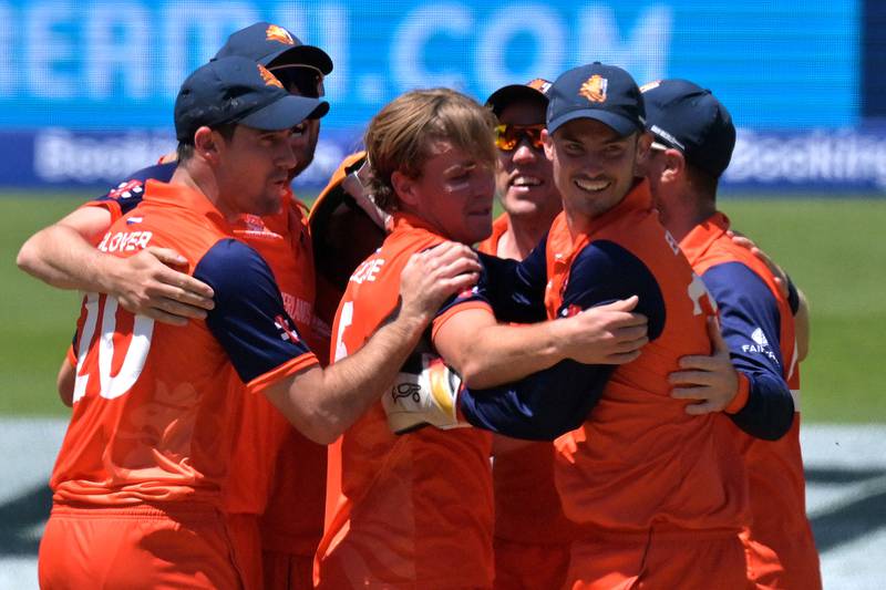 Netherlands's players celebrate their win during the ICC men's Twenty20 World Cup 2022 cricket match between Netherlands and South Africa at Adelaide Oval on November 6, 2022 in Adelaide.  (Photo by Brenton EDWARDS  /  AFP)  /  -- IMAGE RESTRICTED TO EDITORIAL USE - STRICTLY NO COMMERCIAL USE --