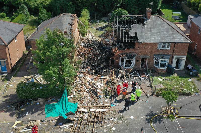 Emergency services at the scene of a deadly gas explosion in Birmingham, England. The fire service confirmed one woman had been killed in the blast on June 27. Getty Images