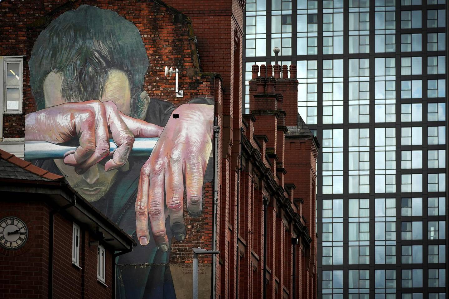 MANCHESTER, ENGLAND - OCTOBER 15: A mural by german artist Case depicts mental health issues on a wall in the city centre on October 15, 2020 in Manchester, England. Manchester was placed in the second of three alert levels this week when the British government introduced a new system for assessing covid-19 risk. However, the Manchester area fears it may be moved into tier 3 "High Alert as it has reported some of the highest numbers of new cases per 100,000 residents. (Photo by Christopher Furlong/Getty Images)
