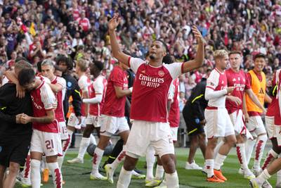 Arsenal players celebrate after winning the FA Community Shield. AP 