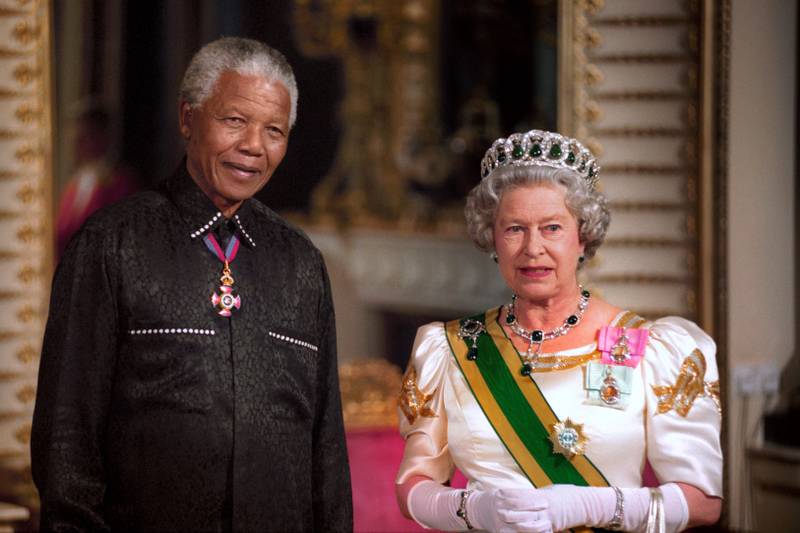 Nelson Mandela, the former president of South Africa, with Queen Elizabeth II, pictured on his arrival at Buckingham Palace for a state banquet in his honour in 1996. PA