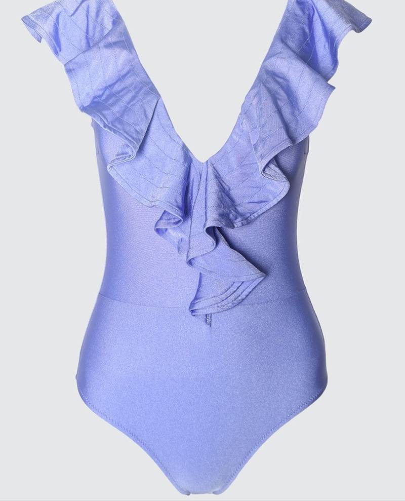 The clean and classic lines of this light lilac Trendyol one-piece ensures the ruffle front is the style star of the swimsuit; Dh107, Trendyol at namshi.com. Photo: Namshi