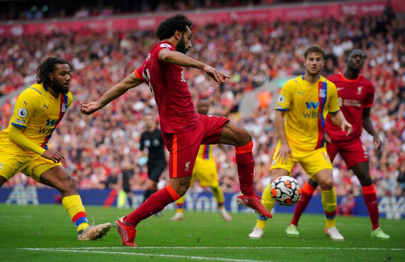 Mohamed Salah scores Liverpool's second goal against Crystal Palace at Anfield. AFP