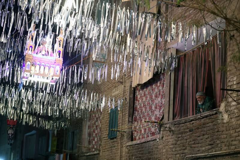 Decorations hang above a street in Giza, Egypt, in preparation for Ramadan, which is expected to begin on March 23. EPA