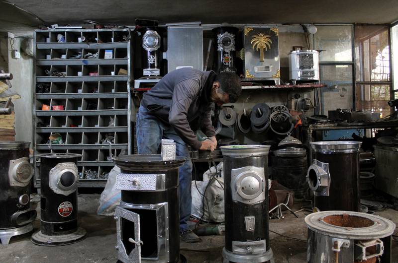 Abdullah Tuweit, who owns a workshop that produces heaters, began to convert them three years ago to allow them to run on more affordable husks and shells