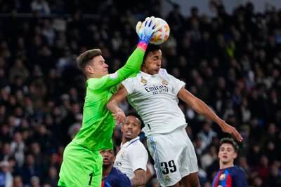 BARCELONA RATINGS: Marc-Andre ter Stegen 8 - Good hands at the near post to stop a Vinicius effort and alert to stop several dangerous Madrid crosses, yet Madrid didn’t have a single effort on target. Faultless performance and a clean sheet at the Bernabéu. AP Photo