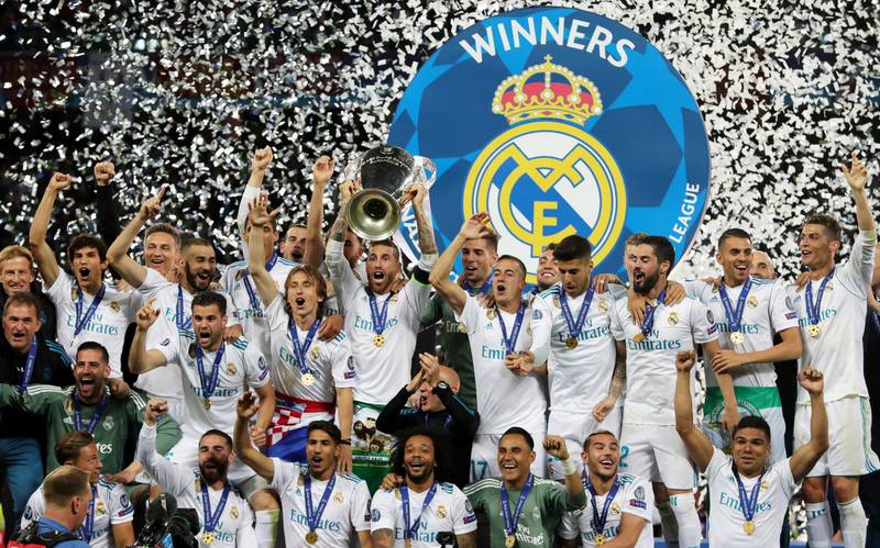 epa06765916 Real Madrid captain Sergio Ramos lifts the trophy after the team won the UEFA Champions League final between Real Madrid and Liverpool FC at the NSC Olimpiyskiy stadium in Kiev, Ukraine, 26 May 2018. Madrid won 3-1.  EPA/ARMANDO BABANI