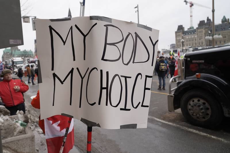 A sign in front of Canada's Parliament reads 'My body, my choice'. Willy Lowry / The National