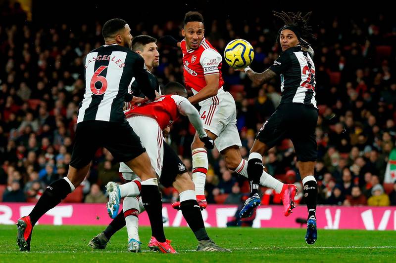 Pierre-Emerick Aubameyang heads home the opener for Arsenal. AFP