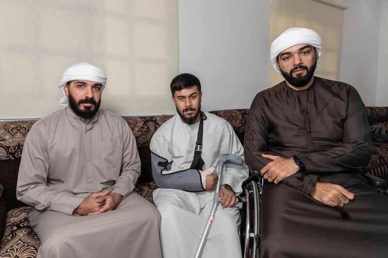 Left to right: Mohammed Al Hrmoodi, Ahmed Al Yassi and Majed Abdulrhman, all safely back in the UAE.  Antonie Robertson / The National
