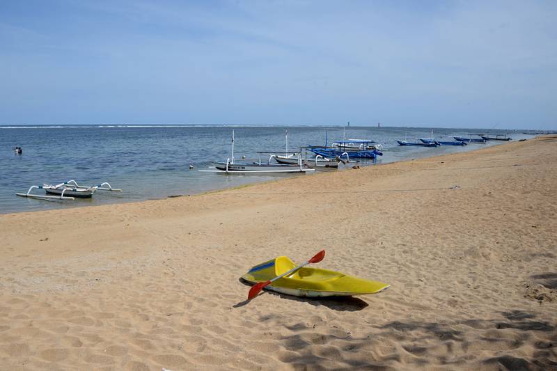 An empty beach at Sanur, near Denpasar on Indonesia's resort island of Bali on October 14, 2021, on the first day of the island's reopening to foreign tourists from 19 countries amid the Covid-19 pandemic. AFP