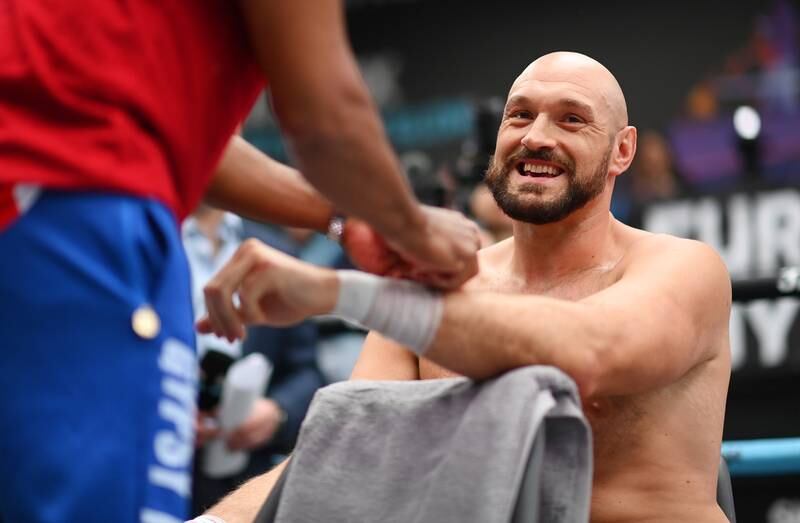 Tyson Fury has his hands wrapped during the media day at Wembley ahead of his title fight against Dillian Whyte. Getty