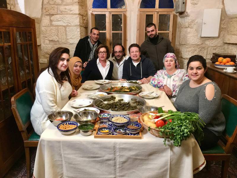Palestinian chef Fadi Kattan invited British chef Jamie Oliver to his house to cook with a group of Muslim and Christian Palestinian women to break down stereotypes. Courtesy Fadi Kattan 