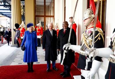 Queen Camilla, King Charles and South African President Cyril Ramaphosa at the Grand Entrance of Buckingham Palace during a state visit in November 2022. This is the first state visit hosted by the UK with King Charles as monarch