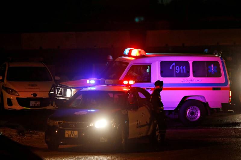 An ambulance on a highway near the Jordanian capital of Amman. A senior Jordanian police officer has been killed during protests in Jordan's southern city of Al Husseiniya. Reuters