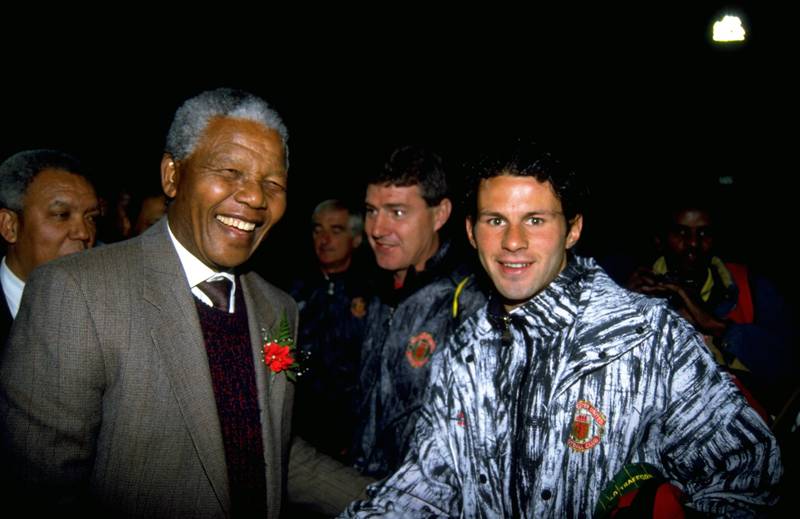 Giggs meets Nelson Mandela during a tour of South Africa with Manchester United in 1993. Getty Images