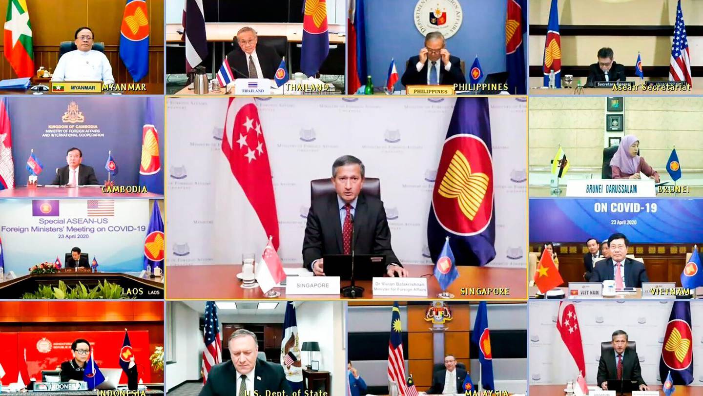 In this photo provided by the Singapore Ministry of Foreign Affairs, Singaporean Foreign Minister Vivian Balakrishnan, center, speaks from Singapore during a videoconference on COVID-19 between ASEAN Foreign Ministers and U.S. Secretary of State Mike Pompeo  Thursday, April 23, 2020. (Singapore Ministry of Foreign Affairs via AP)