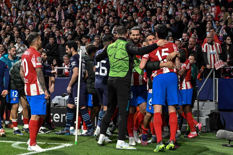 Players fight during the Champions League quarter-final in Madrid. AFP