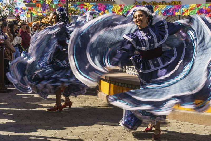 Dancers from Leyenda Ballet Folklorico during the unveiling of a statue of the late Mexican singer Vicente Fernandez in Walnut Park, Los Angeles County. AP