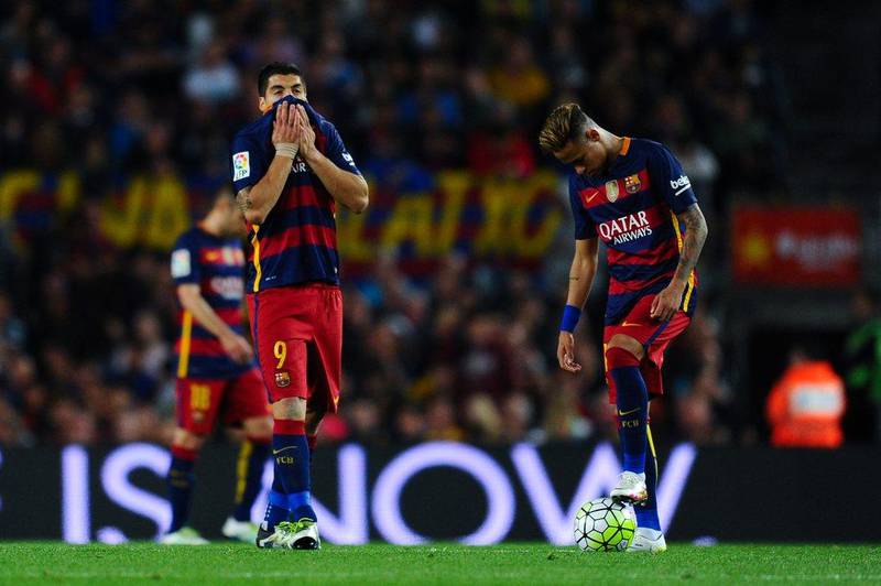 Luis Suarez (L) and Neymar of FC Barcelona look on dejected after Santi Mina of Valencia CF scored his team’s second goal during the La Liga match between FC Barcelona and Valencia CF at Camp Nou on April 17, 2016 in Barcelona, Spain. (Photo by David Ramos/Getty Images)
