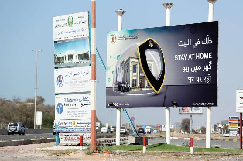 RAK, United Arab Emirates - Reporter: N/A: The police put up a sign saying 'Stay at Home' on the E11 in Ras Al Khaimah. Tuesday, March 31st, 2020. Ras Al Khaimah. Chris Whiteoak / The National