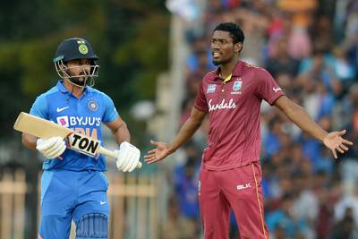 West Indies' Keemo Paul celebrates the wicket of India's Kedar Jadhav during first ODI in Chennai. AFP