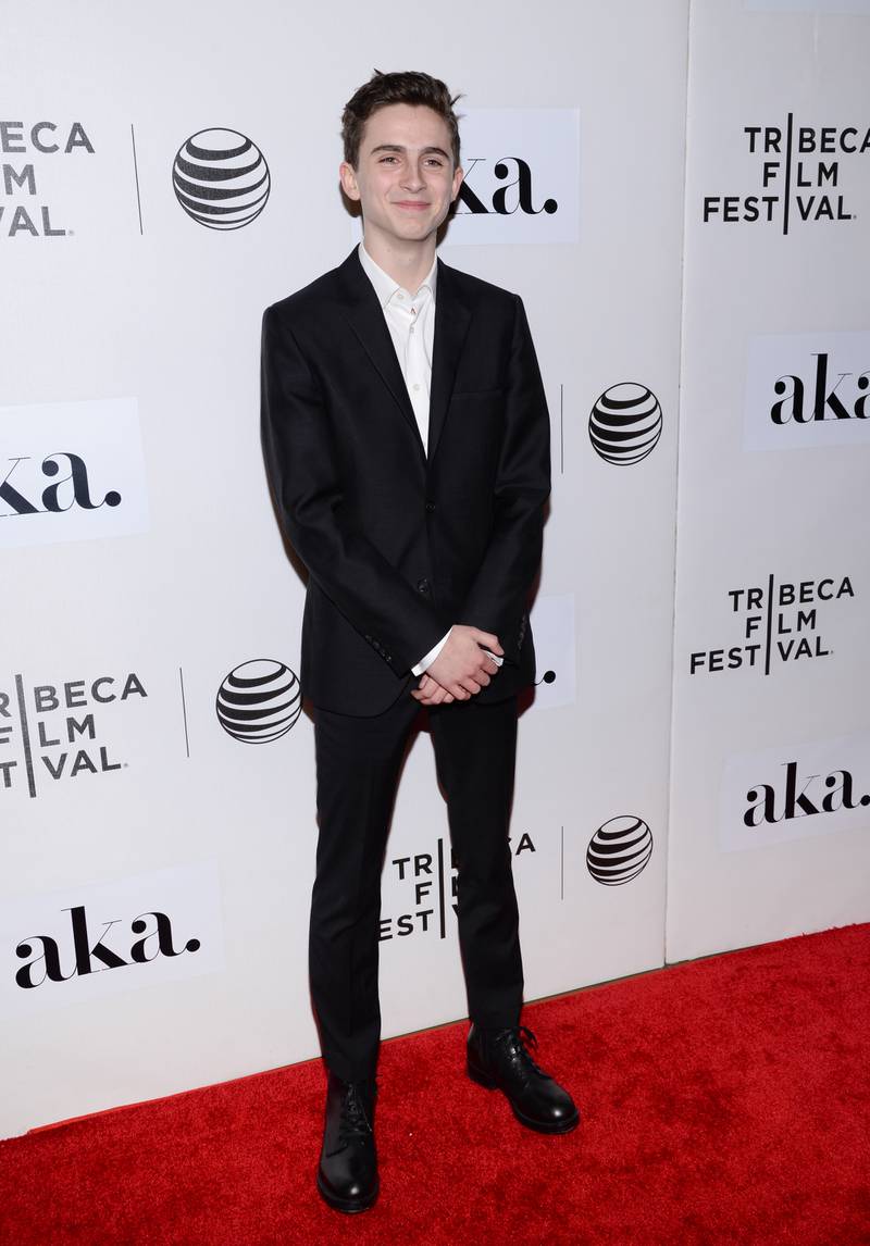 Timothee Chalamet is dapper in an open-necked black suit for the April 2015 premiere of 'The Adderall Diaries' in New York. AP