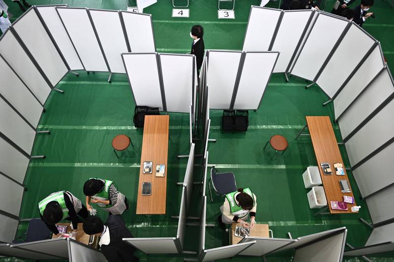 A general view of partitioned rooms are seen at the venue for a Covid-19 coronavirus vaccination drill at the Kawasaki City College of Nursing in Kawasaki. AFP