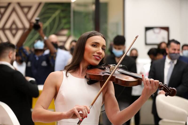 A violinist at the opening.