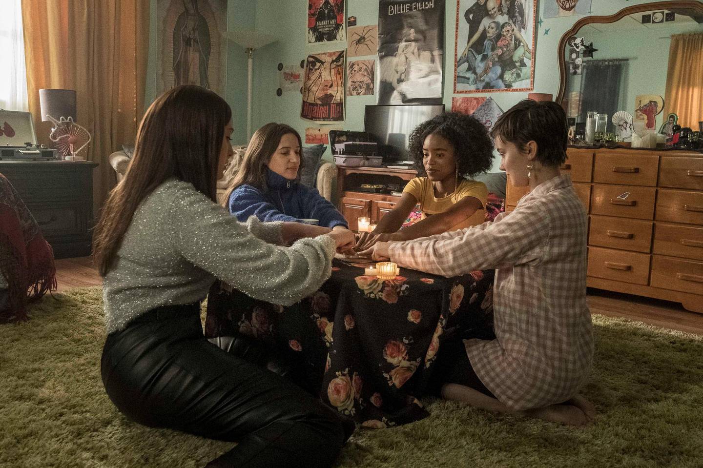 (l-r) Lourdes (Zoey Luna)  Frankie (Gideon Adlon)  Tabby (Lovie Simone) and Lily (Cailee Spaeny) perform rituals and talk about being cautious with their gifts in Columbia Pictures' THE CRAFT: LEGACY. Courtesy Sony Pictures