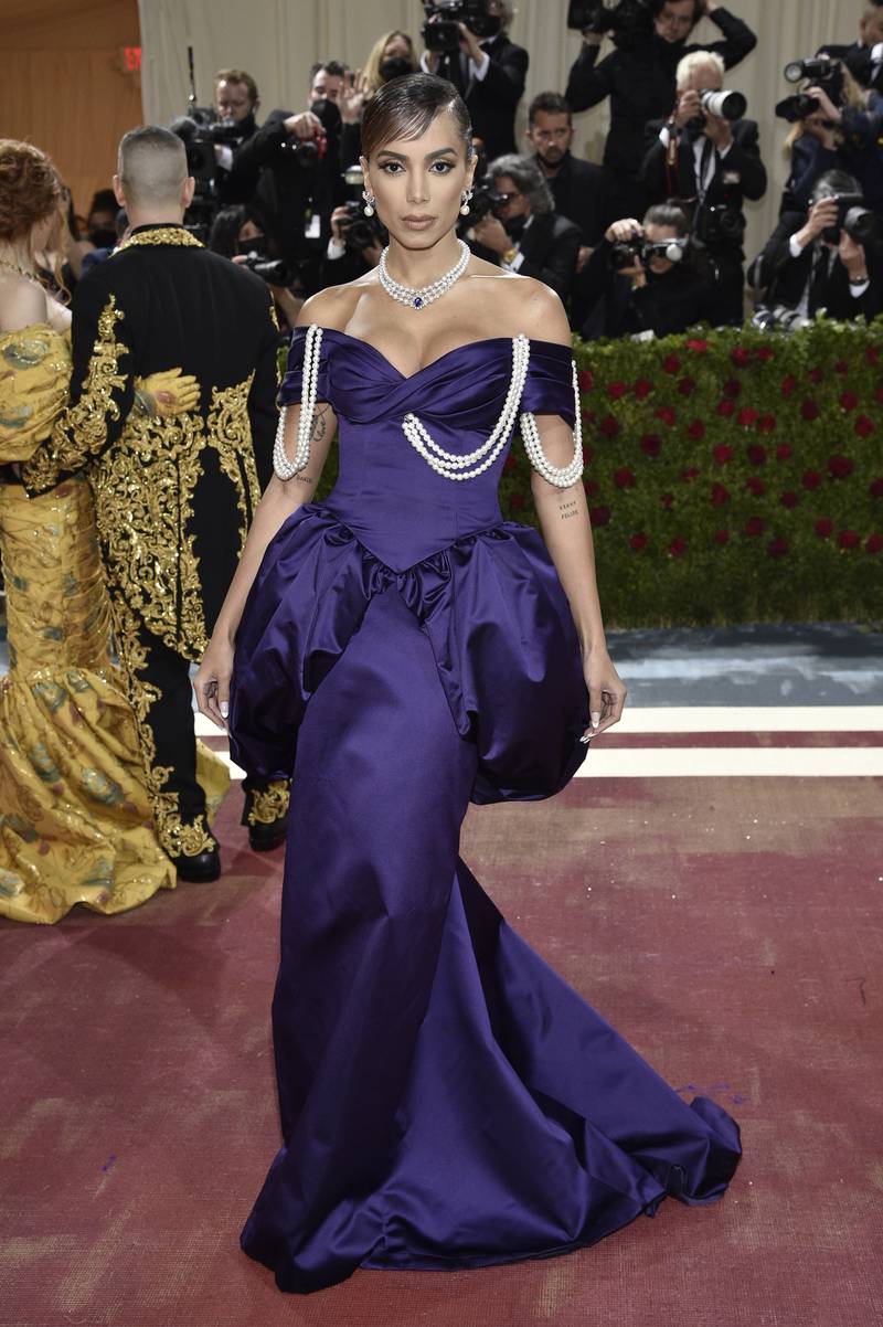 Anitta, wearing purple peplum Moschino. AP Photo