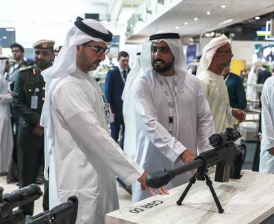 Abu Dhabi, U.A.E., February 20, 2019. INTERNATIONAL DEFENCE EXHIBITION AND CONFERENCE  2019 (IDEX) Day 4--  Colour images.--  H.H. Sheikh Hamed bin Zayed Al Nahyan visits the Caracal stand with EDIC's business development director Hamd Al Ameri.Victor Besa/The NationalSection:  NA