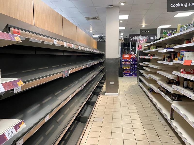 Empty shelves from a Sainsbury's supermarket in London, UK, as shoppers in the British capital stockpile goods in advance of strict lockdown measures to fight coronavirus. Emma Sky for The National