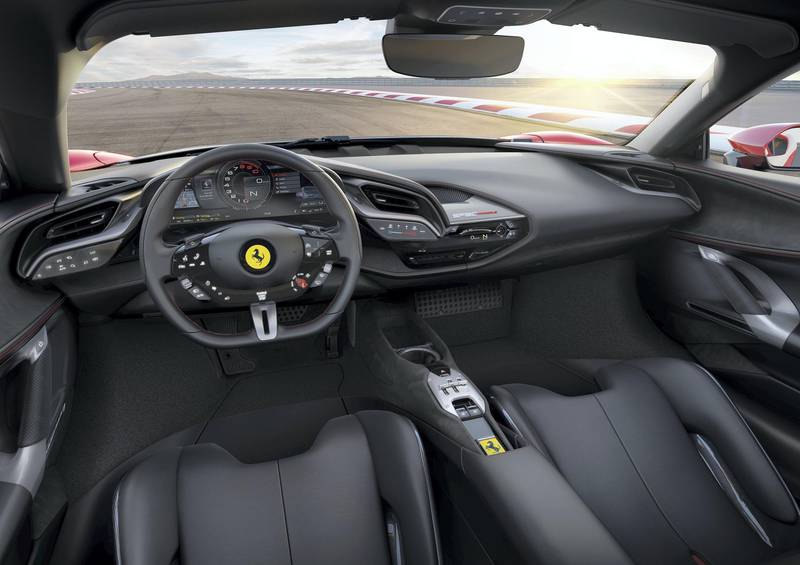 The steering wheel now operates 80 per cent of the car’s internal functions. Courtesy Ferrari