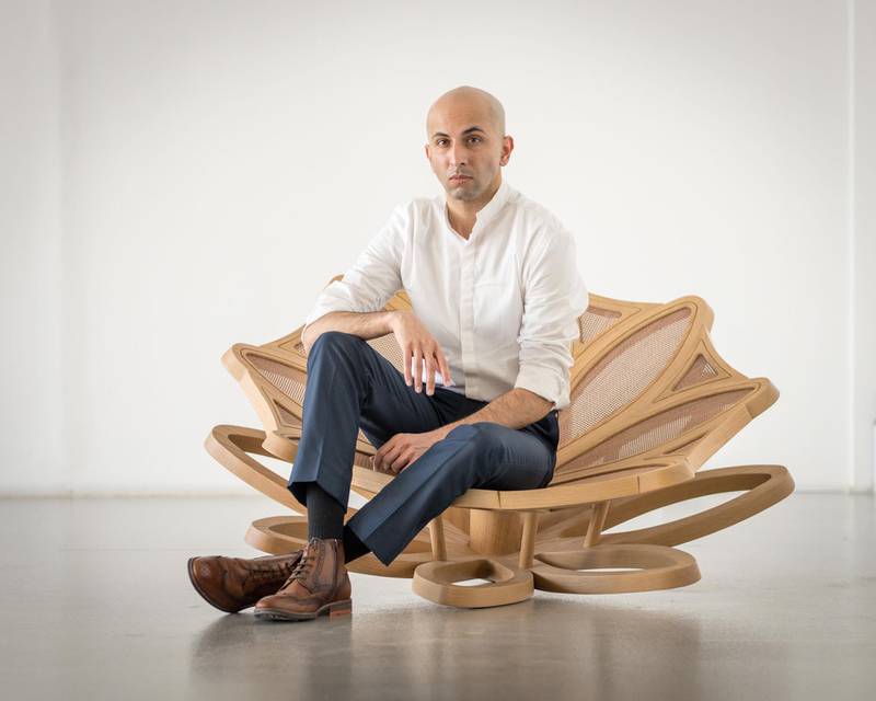 Aezad Muzaffar Alam sits in his winning floating chair. Courtesy Van Cleef & Arpels