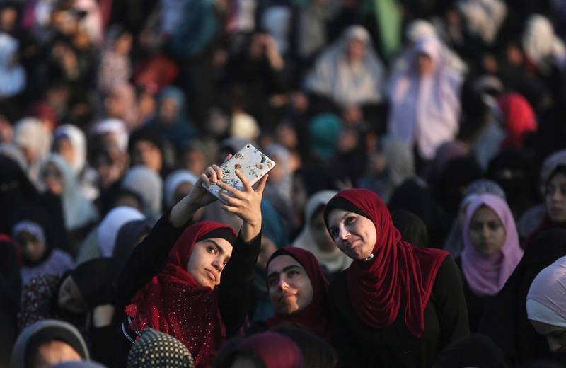 Palestinian attend prayers in Gaza City. AP Photo