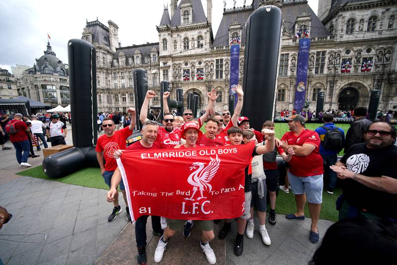 Liverpool fans gather at the Hotel de Ville. PA