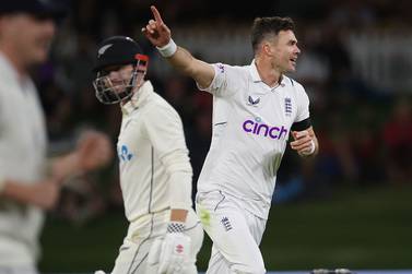 England's James Anderson celebrates New Zealand's Henry Nicholls (L) being caught during day one of the first cricket Test match between New Zealand and England at Bay Oval in Mount Maunganui on February 16, 2023.  (Photo by Marty MELVILLE  /  AFP)