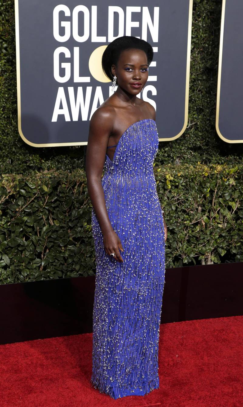 epa07266739 Lupita Nyong'o arrives for the 76th annual Golden Globe Awards ceremony at the Beverly Hilton Hotel, in Beverly Hills, California, USA, 06 January 2019. 