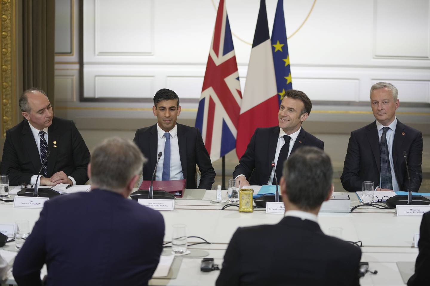 French President Emmanuel Macron hosts UK Prime Minister Rishi Sunak and government ministers at a summit in Paris. Getty 

