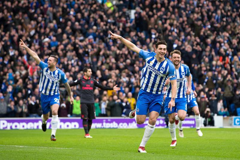 BRIGHTON, ENGLAND - MARCH 04: Brighton & Hove Albion's Lewis Dunk celebrates scoring the opening goal during the Premier League match between Brighton and Hove Albion and Arsenal at Amex Stadium on March 4, 2018 in Brighton, England. (Photo by Craig Mercer - CameraSport via Getty Images)