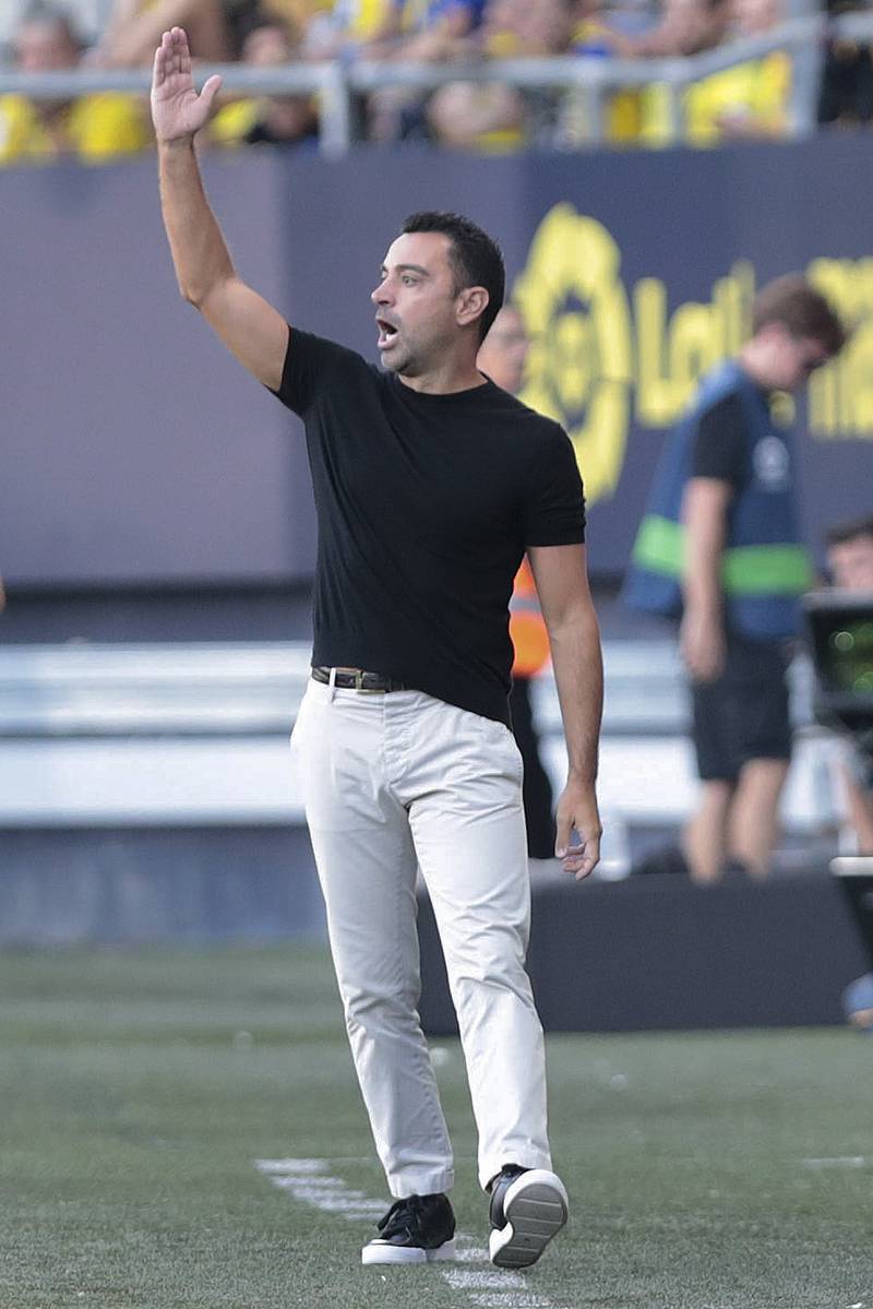 Barcelona coach Xavi Hernandez watches the action. EPA