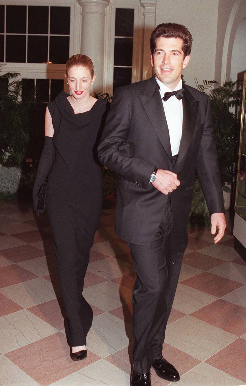 John F Kennedy Jr and his wife Carolyn Bessette Kennedy arrive at the White House for a state dinner in 1998. Both died in a plane crash in 1999. AFP