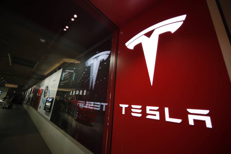 Nasdaq-listed Tesla's revenue during the second quarter jumped 42 per cent to more than $16.9 billion. AP