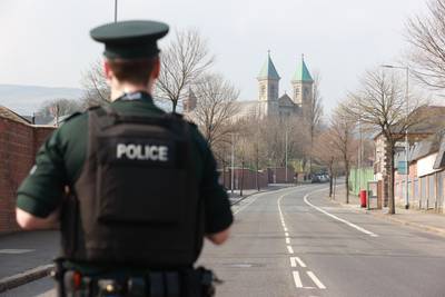 An officer from the PSNI during a security alert at The Houben Centre, Belfast. PA