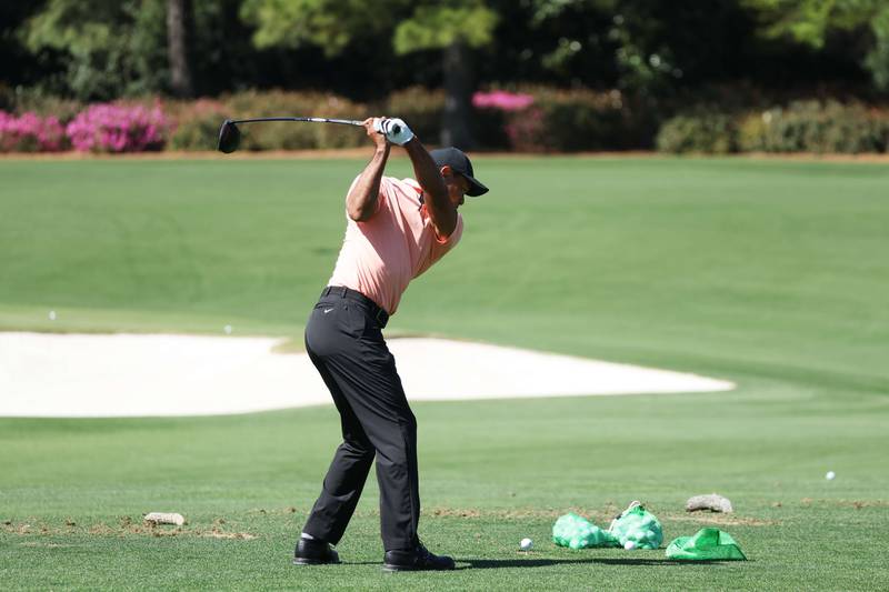 Tiger Woods hits some shots in the practice area at Augusta National Golf Club. AFP