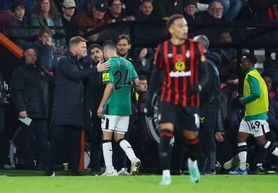 Newcastle United's Miguel Almiron with manager Eddie Howe after being substituted. Action Images 